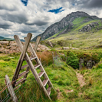 Buy canvas prints of Ladder Stile To Tryfan Mountain by Adrian Evans