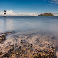 Buy canvas prints of Puffin Island Lighthouse Anglesey by Adrian Evans