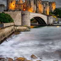 Buy canvas prints of Conwy Castle At Night by Adrian Evans