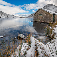 Buy canvas prints of Icy Lake Ogwen Snowdonia by Adrian Evans