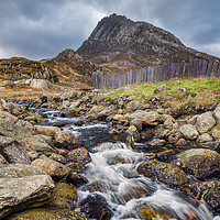 Buy canvas prints of Tryfan Mountain Rapids Snowdonia  by Adrian Evans