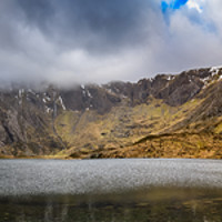 Buy canvas prints of Lake Idwal Winter Snowdonia  by Adrian Evans