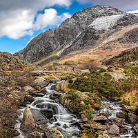 Buy canvas prints of Tryfan Mountain Winter Rapids by Adrian Evans