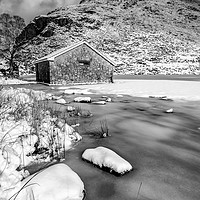Buy canvas prints of Frrozen Lake Snowdonia  by Adrian Evans