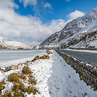 Buy canvas prints of Frozen Lake Snowdonia by Adrian Evans