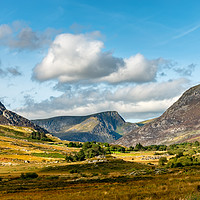 Buy canvas prints of Tryfan and Ogwen Valley Autumn Panorama by Adrian Evans