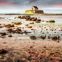 Buy canvas prints of St Cwyfan Church In The Sea by Adrian Evans