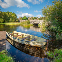 Buy canvas prints of Boat At Padarn Lake Llanberis by Adrian Evans