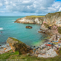 Buy canvas prints of Rhoscolyn Bay Canoes Anglesey Wales by Adrian Evans