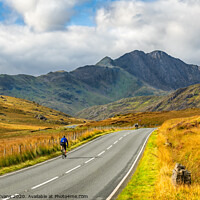 Buy canvas prints of Cyclist Snowdonia Wales by Adrian Evans