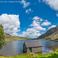 Buy canvas prints of Lake Ogwen and Tryfan Mountain Wales by Adrian Evans