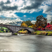 Buy canvas prints of Llanrwst Bridge and Ivy Cottage Wales by Adrian Evans