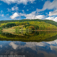 Buy canvas prints of Geirionydd Lake Autumn reflections by Adrian Evans