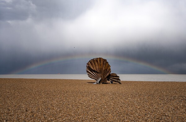 A rainbow over The Scallop on Aldeburgh beach  Picture Board by Gary Pearson