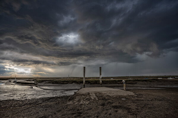 An approaching storm - Brancaster Staithe  Picture Board by Gary Pearson