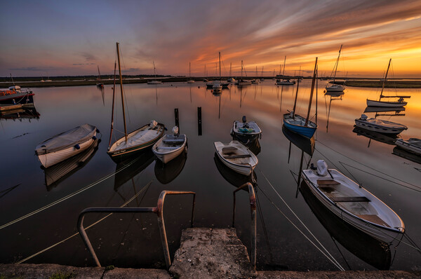 Sunrise reflections - Wells harbour  Picture Board by Gary Pearson
