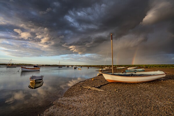 Rainbows over the marsh at Burnham Overy Staithe  Picture Board by Gary Pearson