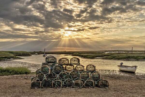 God rays over Brancaster Staithe  Picture Board by Gary Pearson