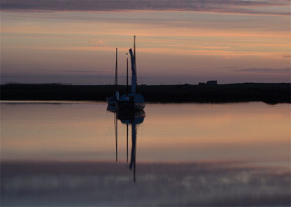 Sunset reflections Brancaster Staithe Picture Board by Gary Pearson
