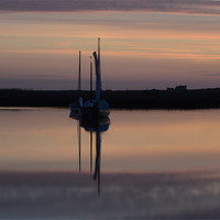 Buy canvas prints of Sunset reflections Brancaster Staithe by Gary Pearson