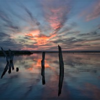 Buy canvas prints of Sunset over Thornham marsh by Gary Pearson