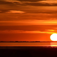 Buy canvas prints of Sunset across The Wash by Gary Pearson