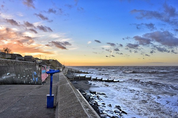 Sheringham sea front at sunset Picture Board by Gary Pearson