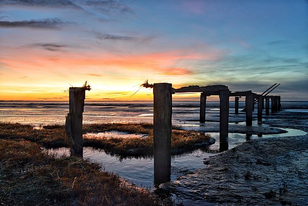 Sunset over Snettisham marsh Picture Board by Gary Pearson
