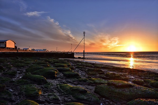 Sunset over Hunstanton beach Picture Board by Gary Pearson