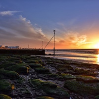 Buy canvas prints of Sunset over Hunstanton beach by Gary Pearson