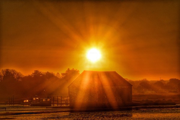 Spring tide sunrise over Thornham Picture Board by Gary Pearson