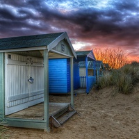 Buy canvas prints of Hunstanton beach huts at sunset by Gary Pearson