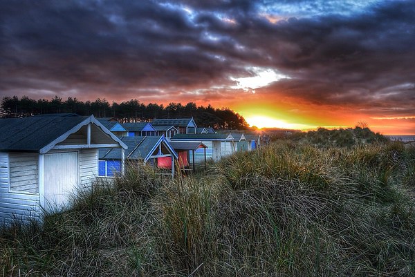 Hunstanton beach huts sunset scene Picture Board by Gary Pearson