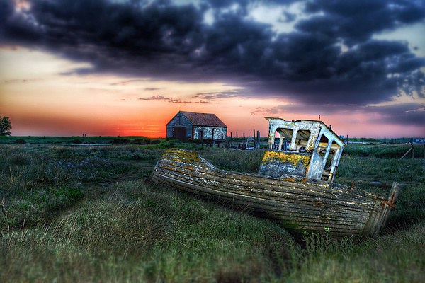 Sunset over Thornham in Norfolk Picture Board by Gary Pearson
