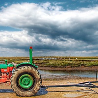 Buy canvas prints of Green and red tractor Brancaster by Gary Pearson