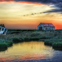Buy canvas prints of Sunset over Thornham by Gary Pearson