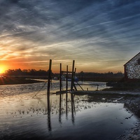 Buy canvas prints of The old coal barn Thornham by Gary Pearson