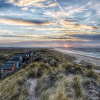 Buy canvas prints of Sunset over Brancaster beach by Gary Pearson