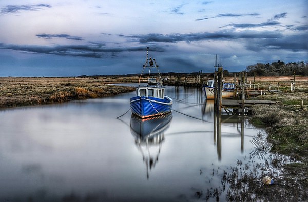 Fishing boats at Thornham quay Picture Board by Gary Pearson