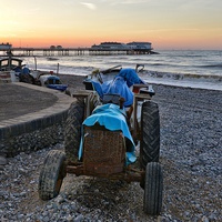 Buy canvas prints of Cromer beach old tractor by Gary Pearson