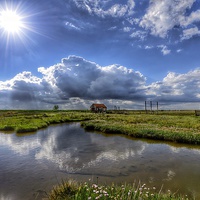 Buy canvas prints of The old coal barn Thornham by Gary Pearson