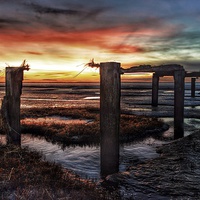 Buy canvas prints of  Sunset over the old jetty at Snettisham by Gary Pearson