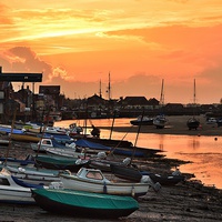 Buy canvas prints of  Sunset over Wells harbour by Gary Pearson