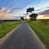 Buy canvas prints of A road in to Ringstead by Gary Pearson