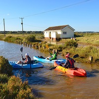 Buy canvas prints of  Kayaking along the road - Brancaster 30/9/15 by Gary Pearson