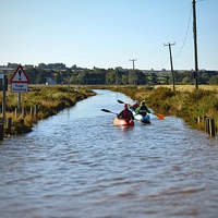 Buy canvas prints of Kayaking down the road at Brancaster - 30/9/15 by Gary Pearson