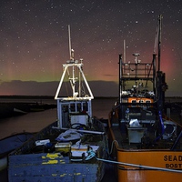 Buy canvas prints of  The Northern lights pay a rare visit to Brancaste by Gary Pearson