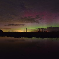 Buy canvas prints of Northern lights over the old coal barn - Thornham, by Gary Pearson