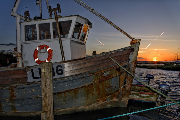 Lord Sam LN86 at sunset - Brancaster Staithe       Picture Board by Gary Pearson