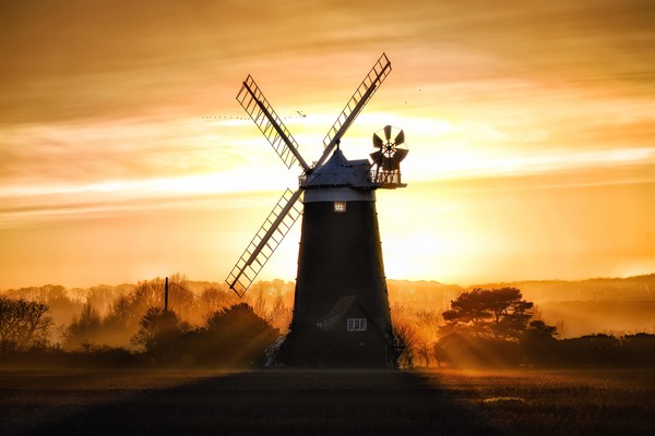 Burnham Overy Staithe mill at sunset  Picture Board by Gary Pearson